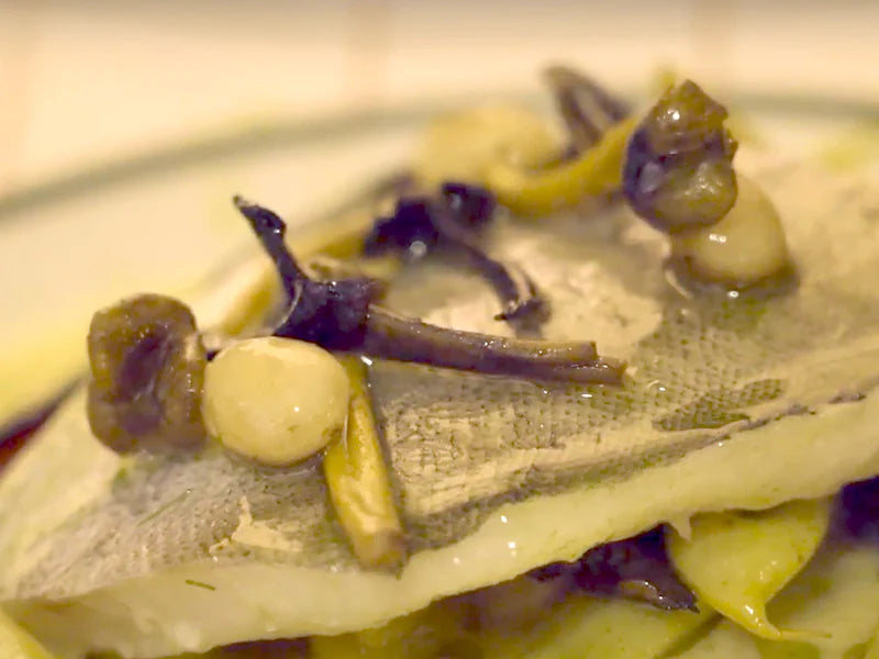 Lieu jaune cuit de peur, fumet de poisson et légumes de saison