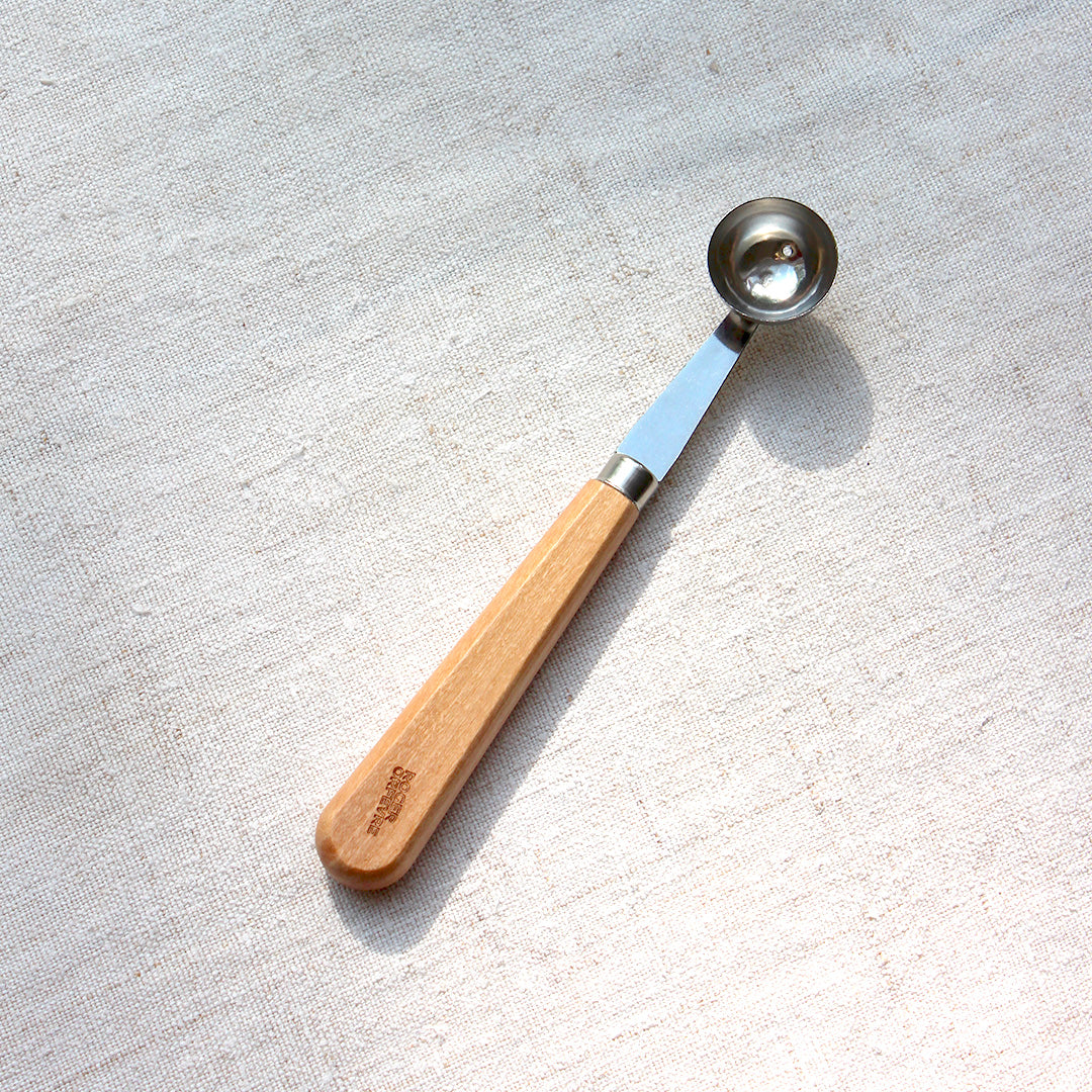 Cuillère à melon en inox manche en olivier
