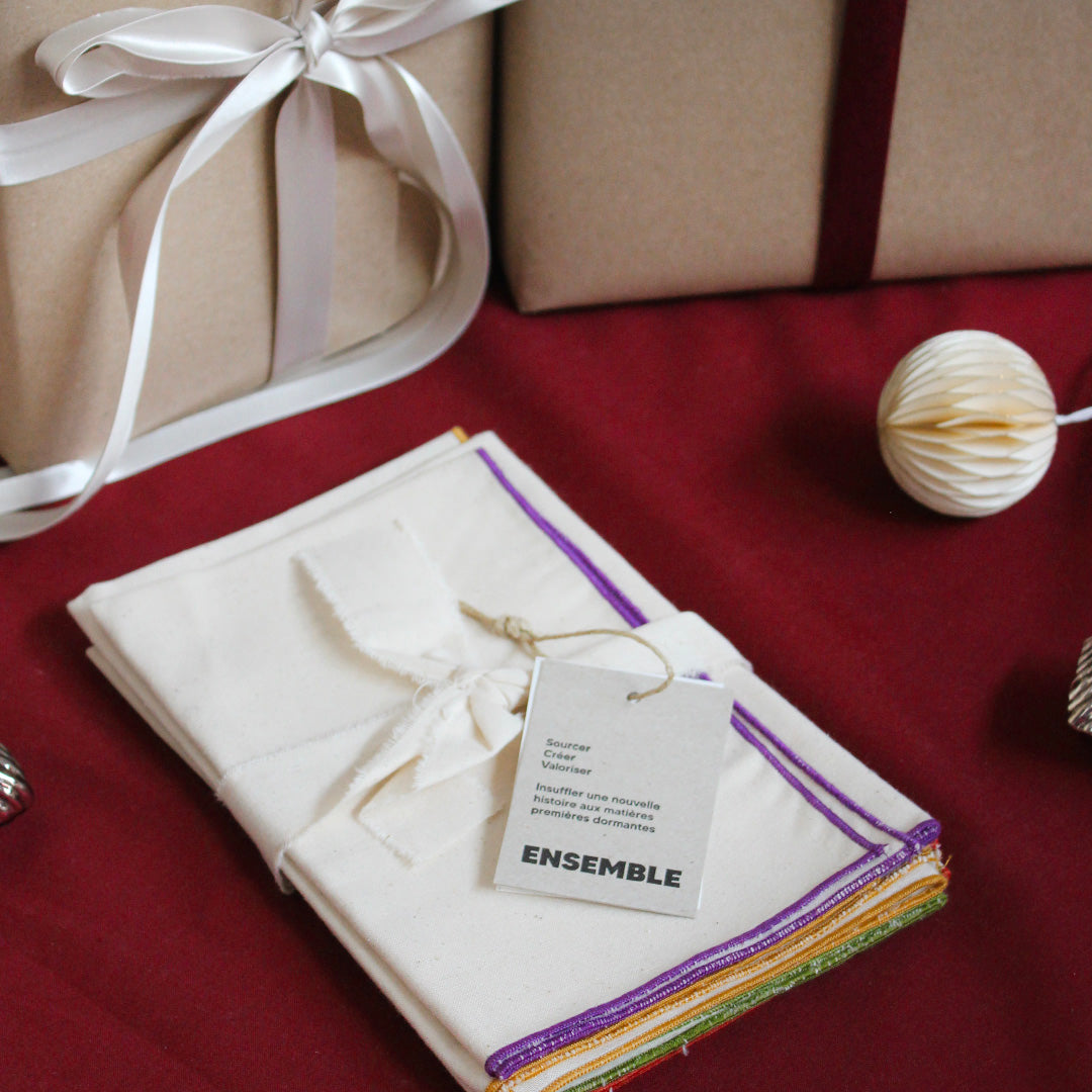 Quatre serviettes en coton écru