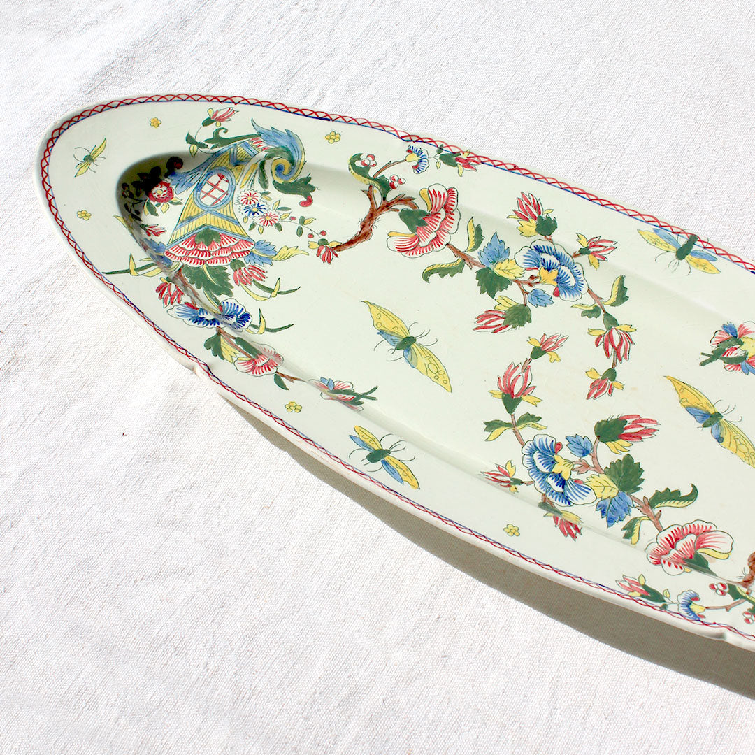 Plat à poisson au décor d’oiseaux et papillons Gien