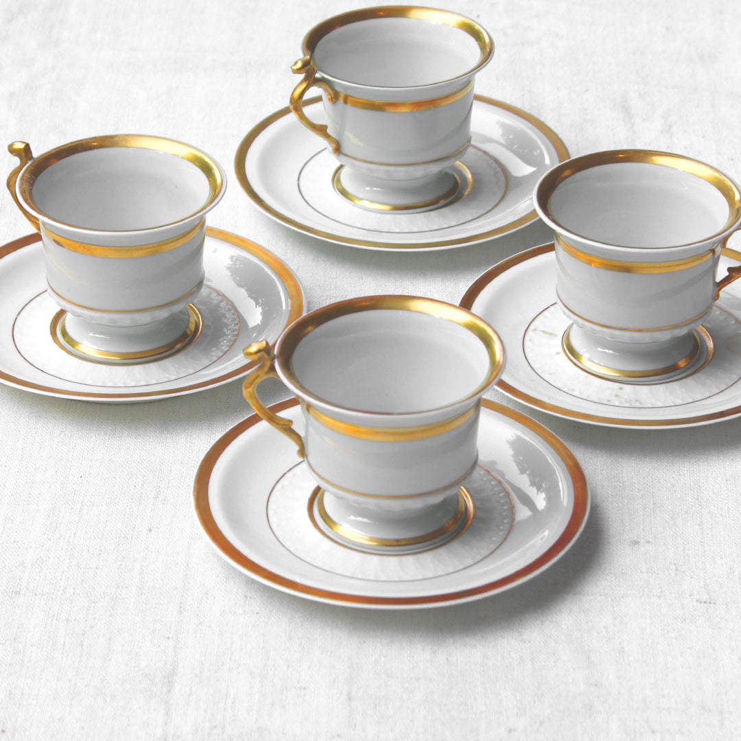 4 tasses à café en porcelaine au liseré doré vintage