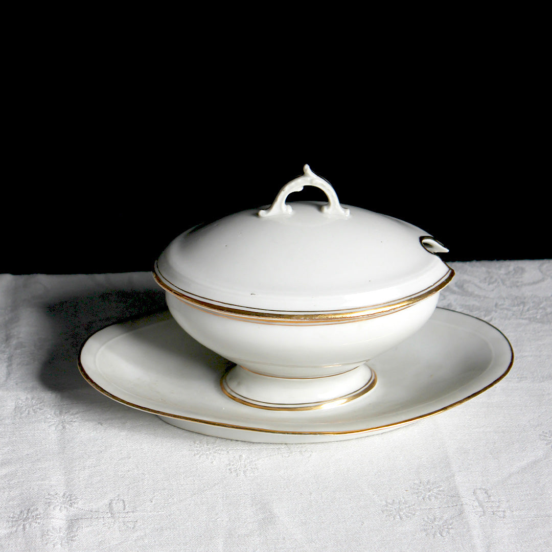 Saucière en porcelaine liseré doré