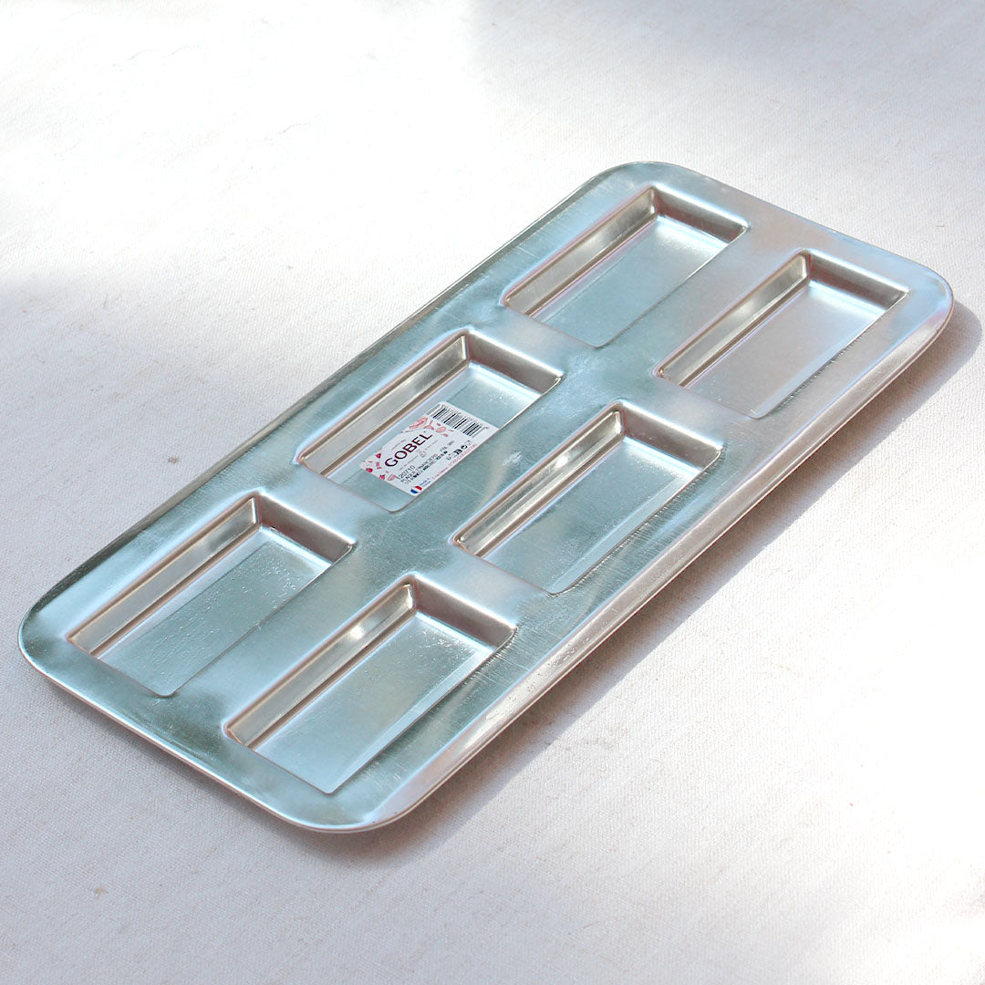 Plaque à financiers en fer