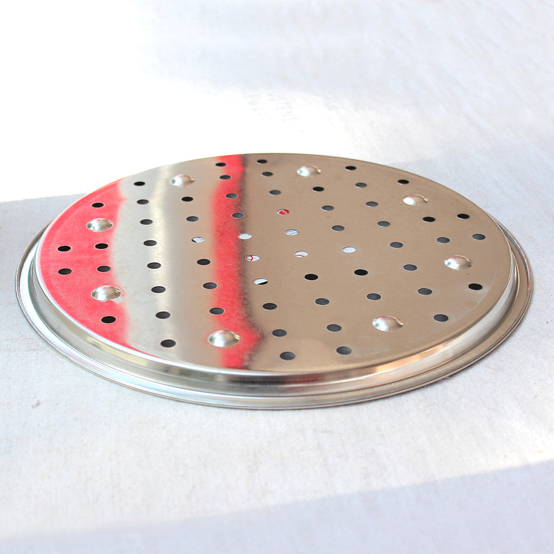 Plaque à pizza en fer blanc