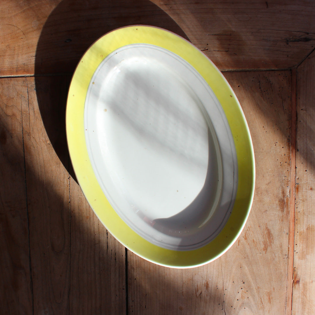 Plat ovale bordure jaune Gien