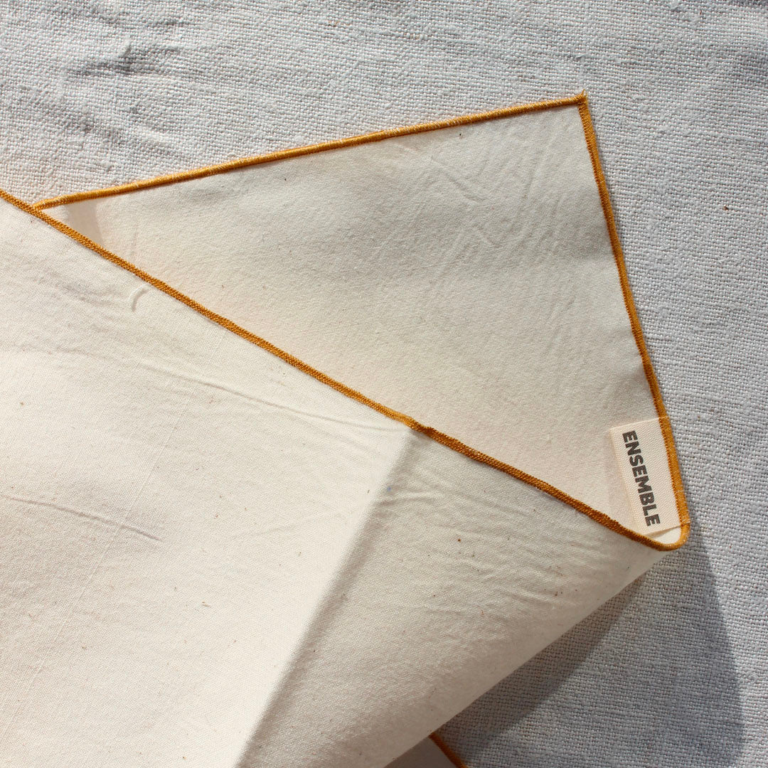 Quatre serviettes en coton écru