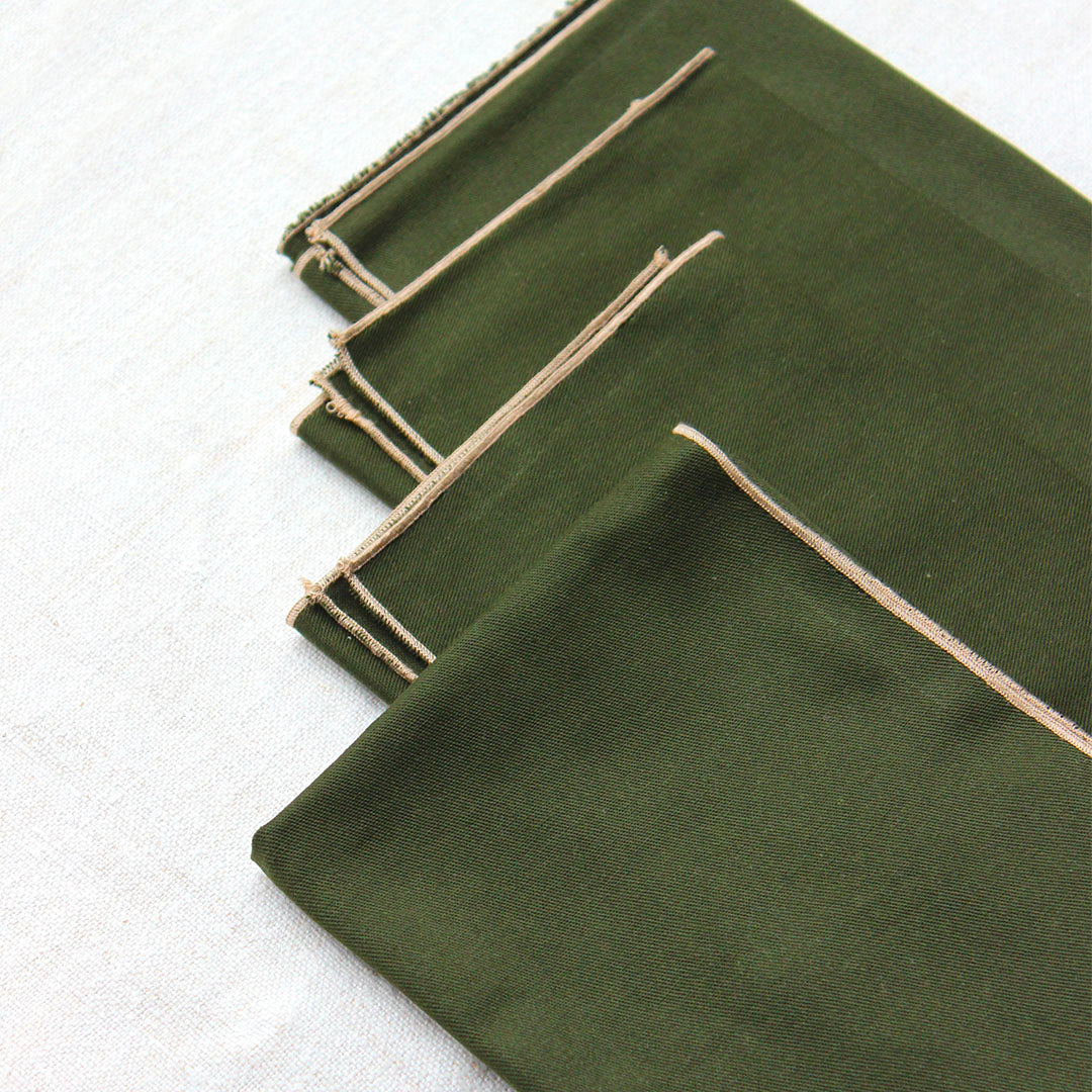 4 serviettes kaki liseré beige