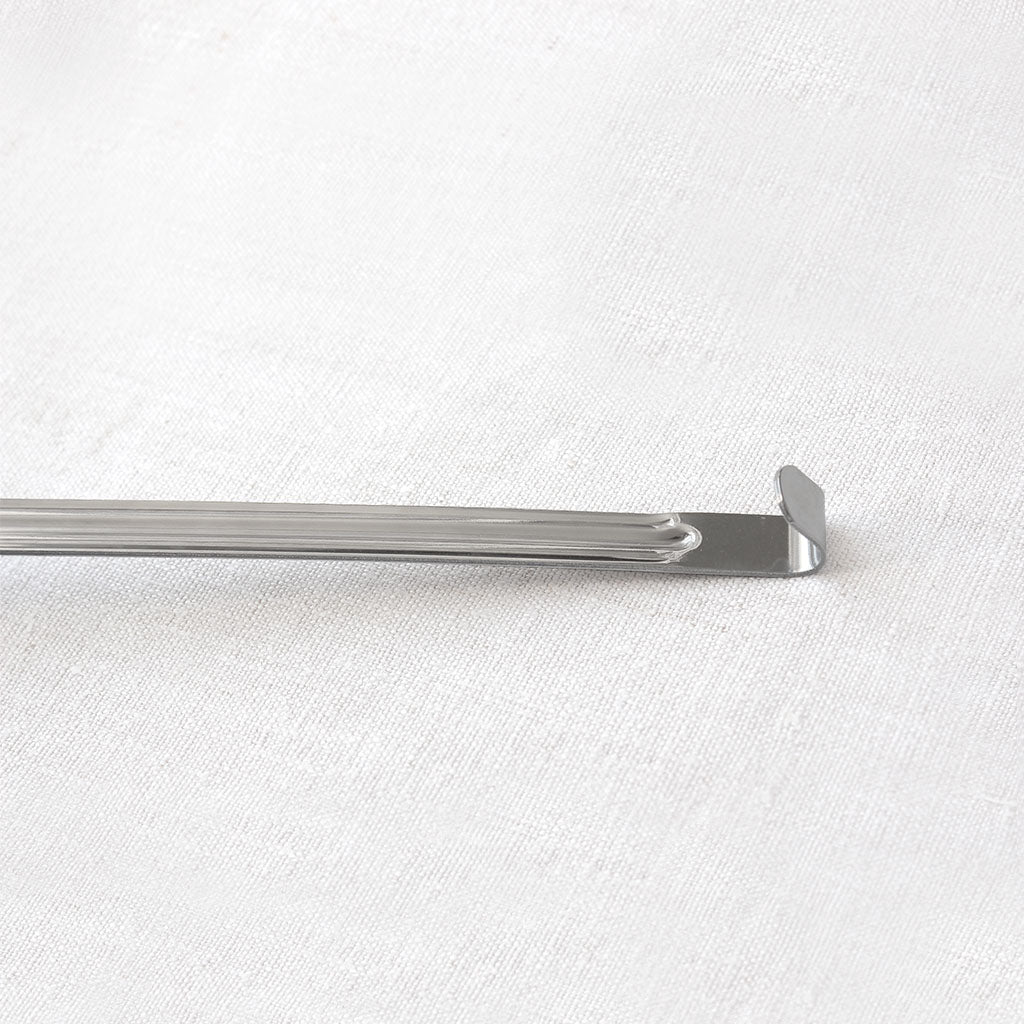 Écumoire perforée en inox