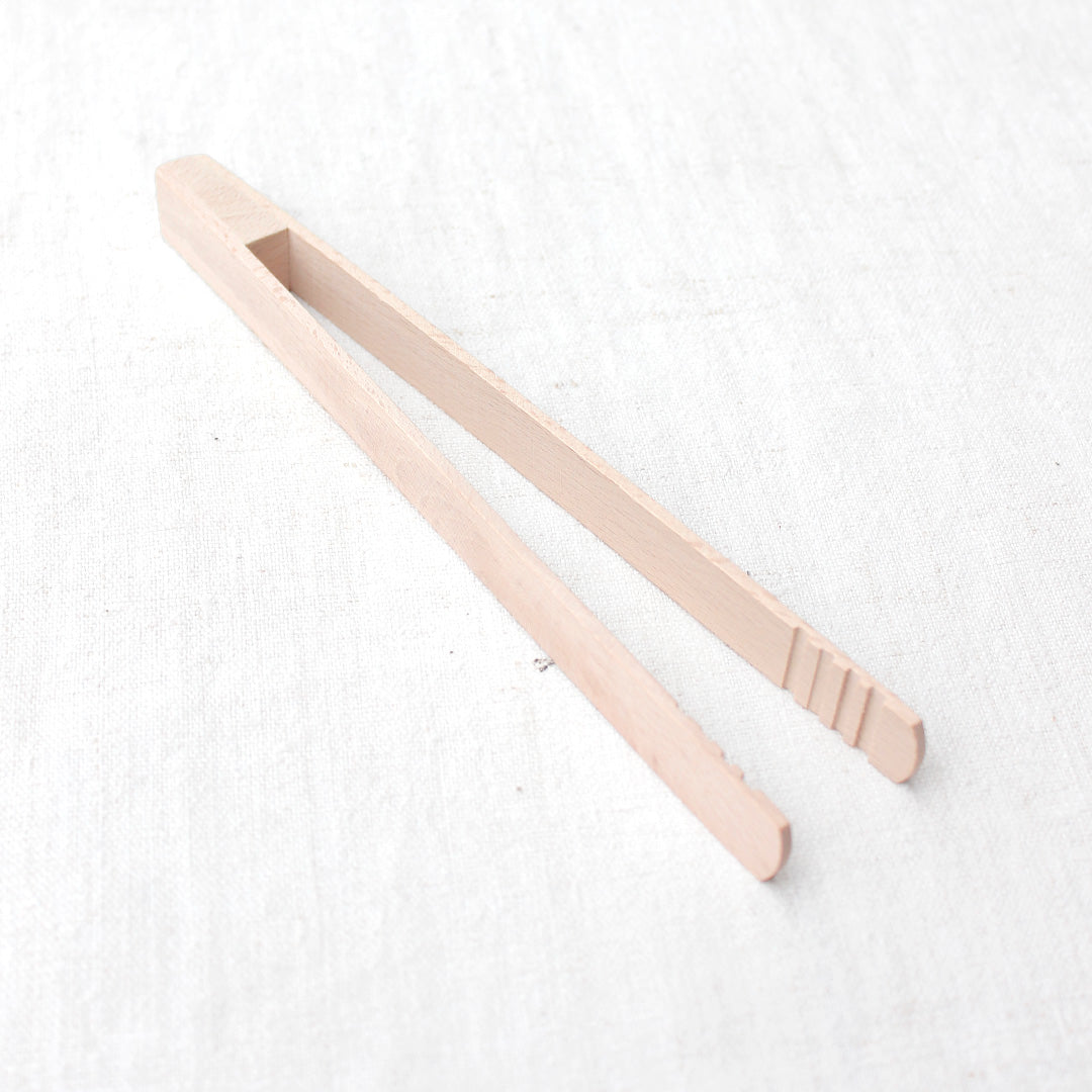 Pince à toast en bois