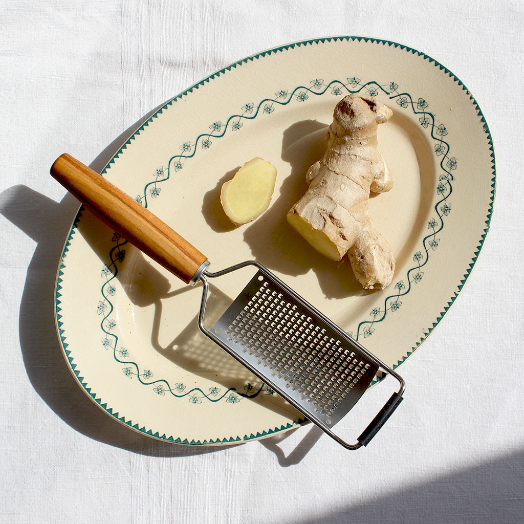 Râpe en inox manche en bois de prunier