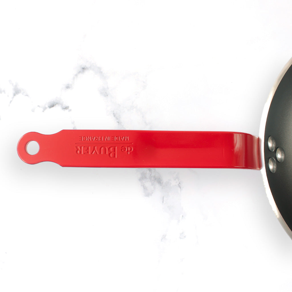 Poêle antiadhésive avec queue rouge