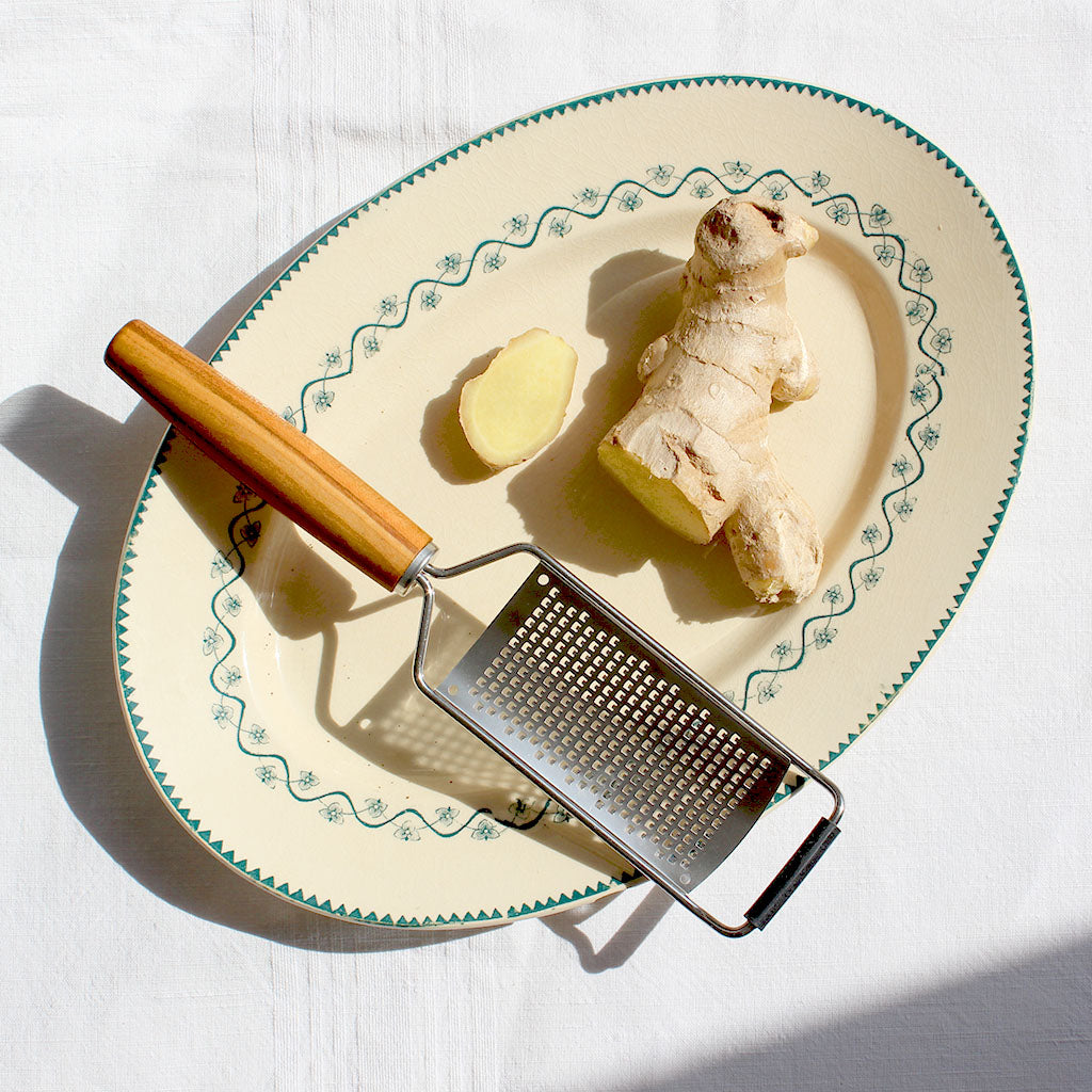 Râpe en inox manche en bois de prunier