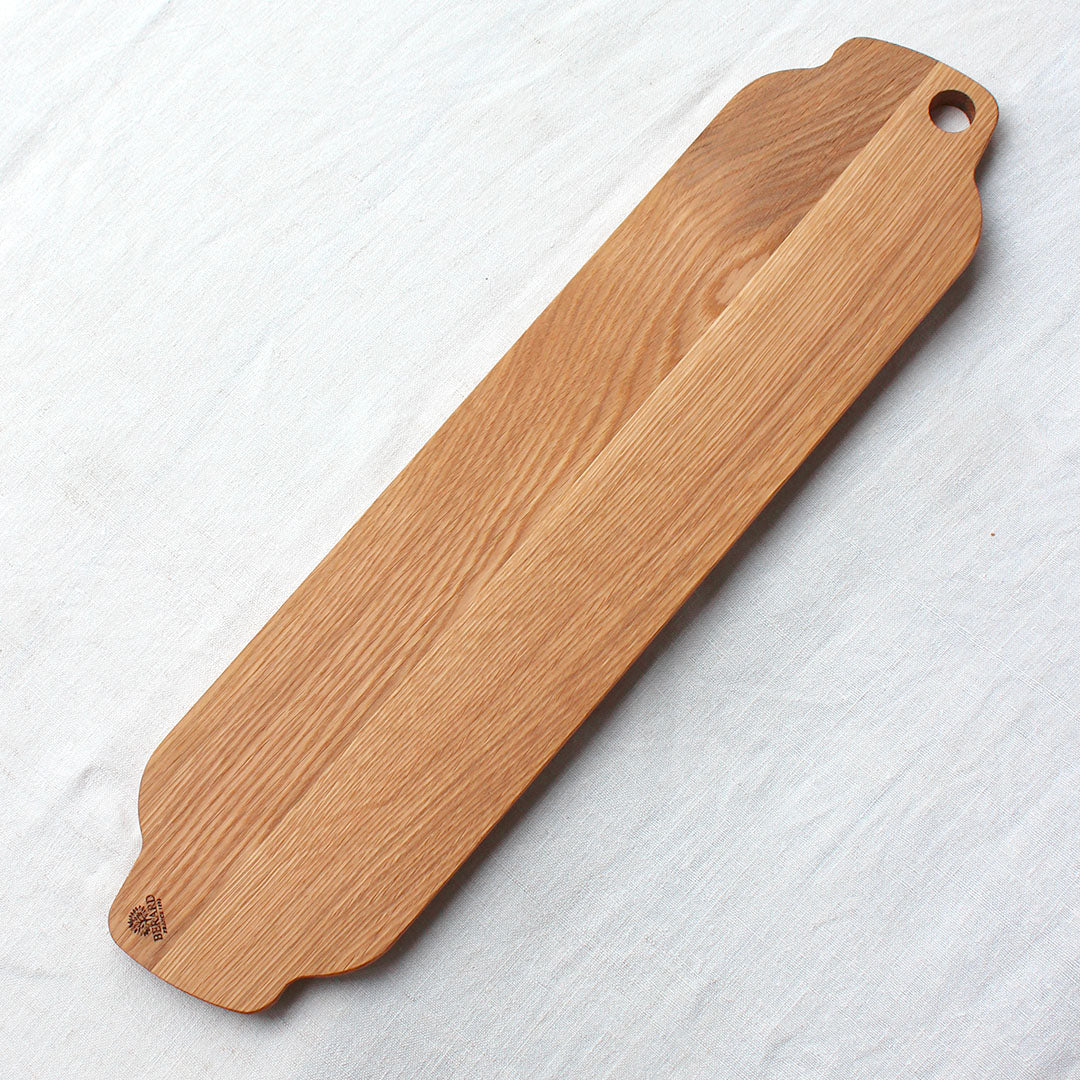 Longue planche d'apéro en bois de chêne