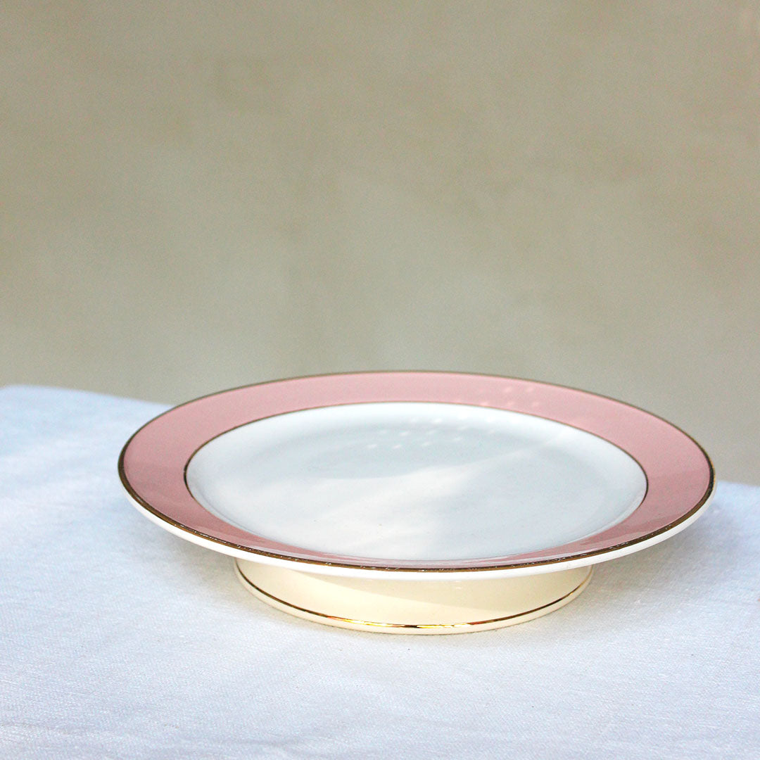Assiettes sur pied en faïence rose