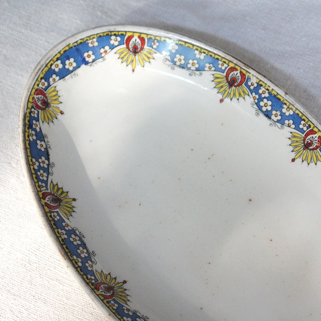 Ravier fleuri en faïence