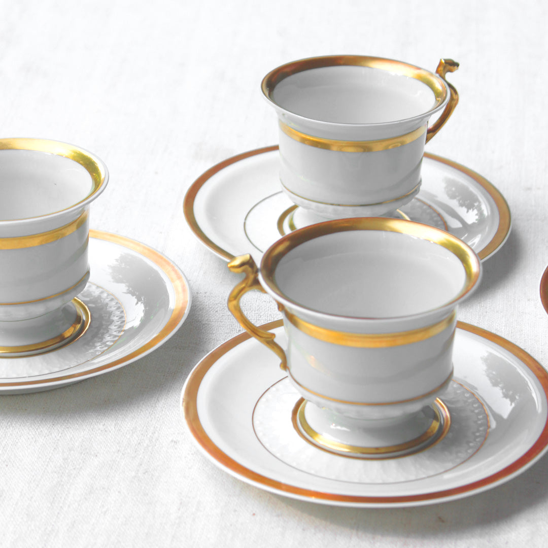 4 tasses à café en porcelaine au liseré doré vintage