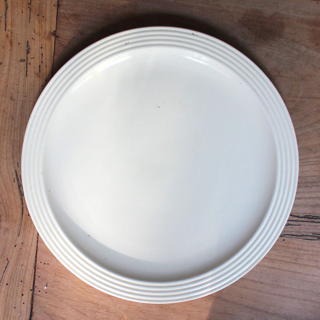 Plat rond en faïence ancienne
