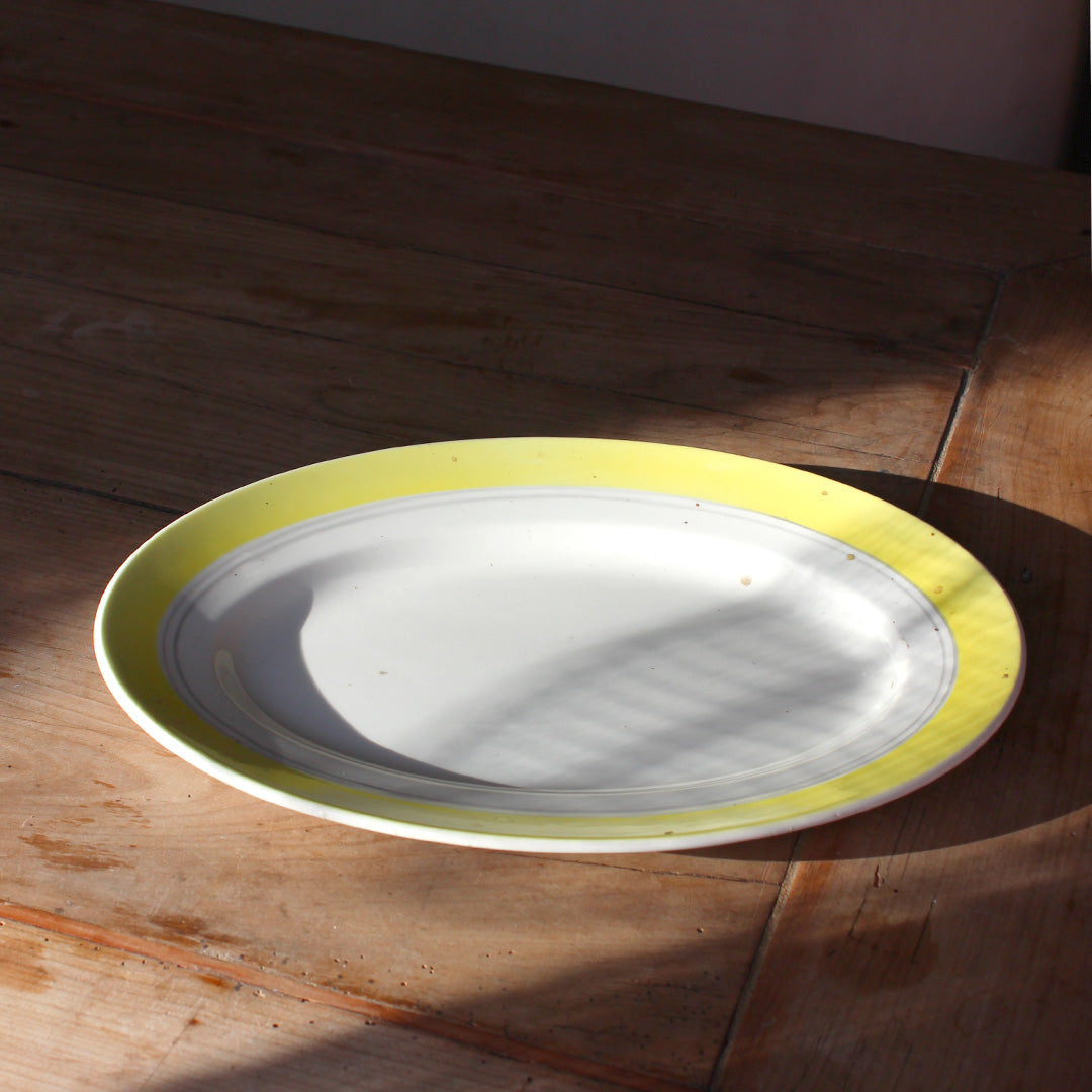 Plat ovale bordure jaune Gien