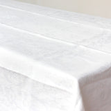 Nappe ancienne damassée