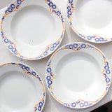 8 assiettes creuses aux marguerites bleues